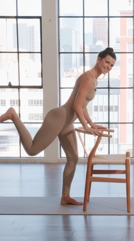 Woman exercising in red workout attire